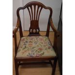 A Georgian mahogany elbow chair.