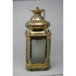 An early 20th Century decorative brass porch lantern.