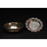 A silver pin dish and a small pierced silver bowl.