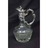 A fine silver plated and cut glass claret jug.