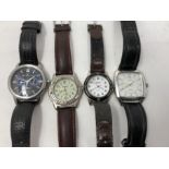 Four assorted gentlemen's wristwatches.