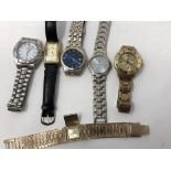 Seven assorted wristwatches.