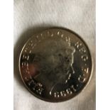 Eleven assorted Queen Elizabeth II Commemorative £5 coins.