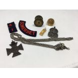 A box of assorted collectables including military, coins, a silver ARP badge.