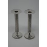 A pair of Graham Watling designed candlesticks.