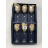 A boxed set of six Bohemia Crystal wine glasses (unused).