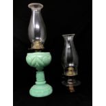 Two oil lamps.