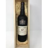 A cased bottle of Taylor's 10 Year Old Tawny Port.