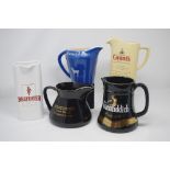 "Breweriana" - five advertising water jugs.