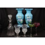 A collection of vases and drinking glasses.