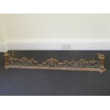 A Victorian pierced cast iron fender.