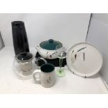 An assortment of A College Denby "Greenwheat" tableware.