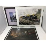 An assortment of mostly framed railway prints.