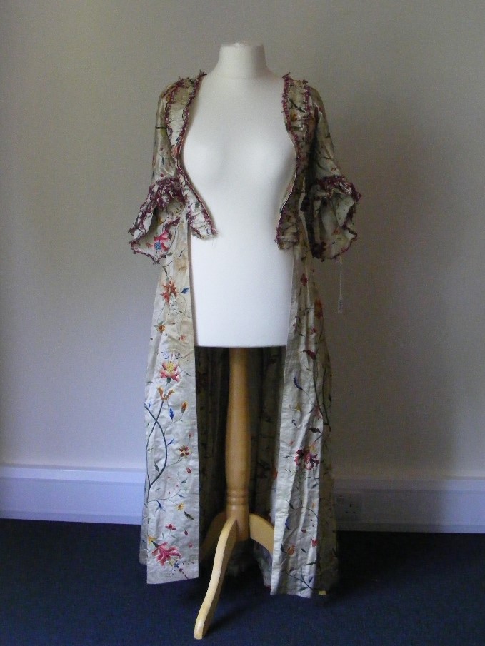 A rare and fine example of an 18th Century hand embroidered silk open robe. - Image 2 of 4