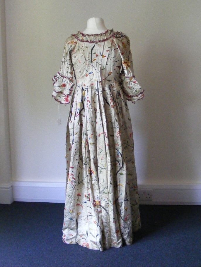A rare and fine example of an 18th Century hand embroidered silk open robe.