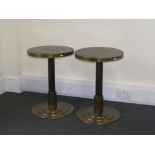 A pair of contemporary embossed brass circular occasional tables, Middle Eastern design.