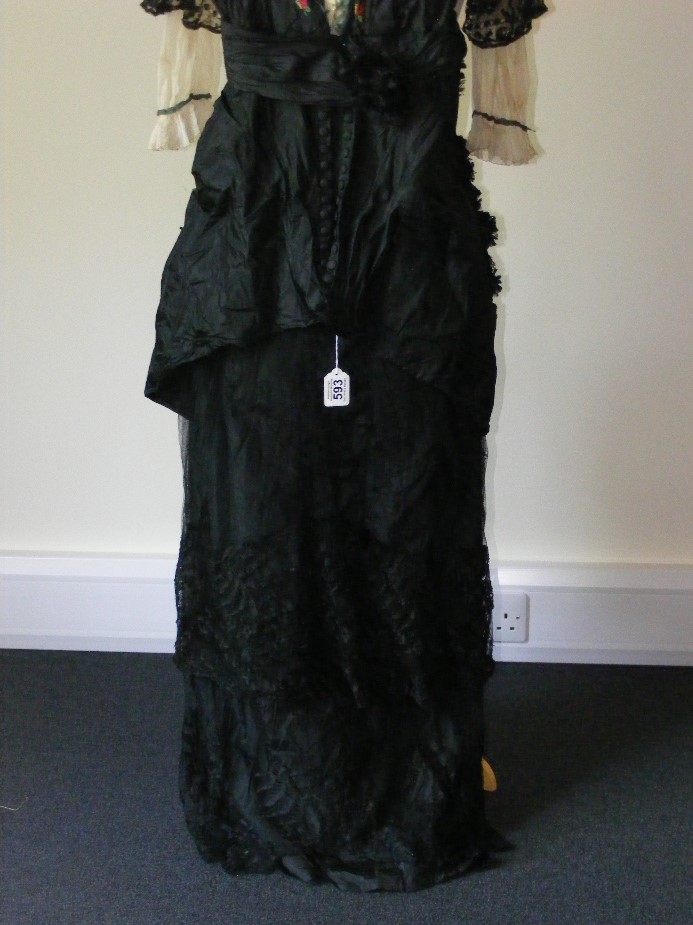 A day/afternoon dress circa 1880, black silk and net with the silk embroidered with flowers. - Image 3 of 3