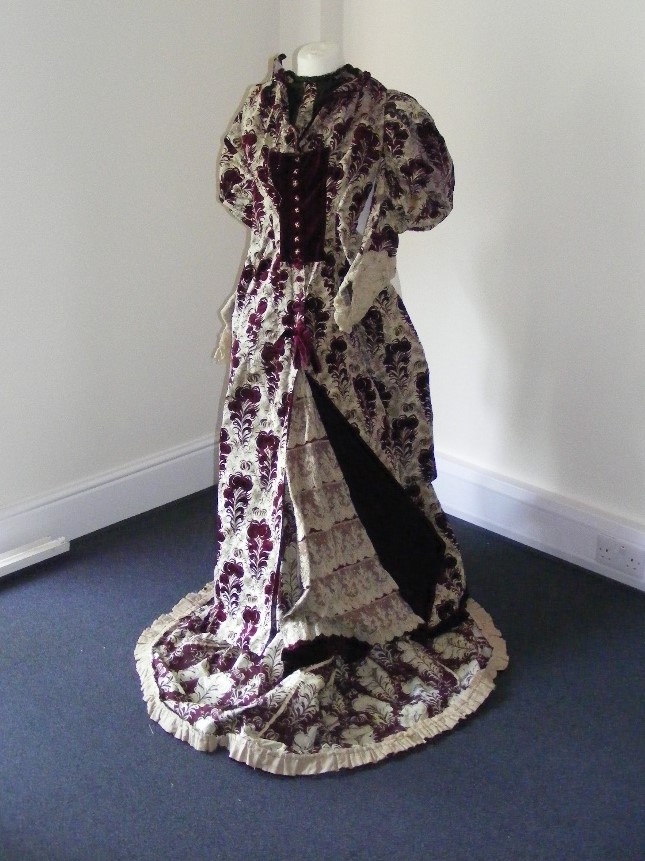 An assortment of Edwardian and Victorian clothing, fabric and accessories.