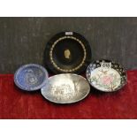 An assortment of ceramics including a Wedgwood black basalt bowl.