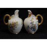 A pair of Royal Worcester blush ivory flat back jugs.