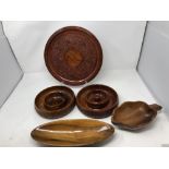 A box of assorted treen including bowls, dishes, trays, etc.