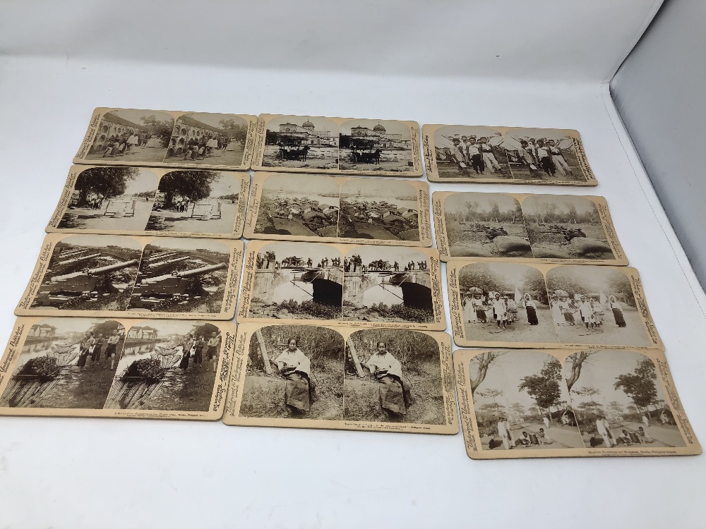 A boxed selection of stereoview cards.