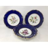 A 19th Century hand painted cobalt blue and gilt decorated fruit bowl and two matching plates.