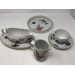 A box of assorted Royal Worcester Evesham tableware.