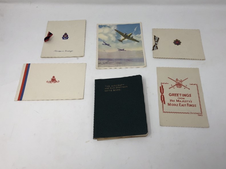 Five original WWII Christmas cards and the Aircraft and Raid Spotter's Note Book.