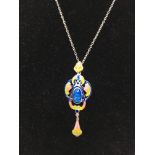 A silver and enamel pendant necklace in the Charles Horner style.