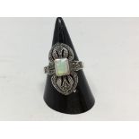 A silver Art Deco style marcasite and opalite dress ring.