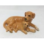 A Royal Doulton figure "Labrador and Pup".