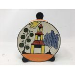 A Lorna Bailey signed Art Deco style jar and cover.