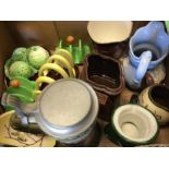 A box of assorted ceramics.