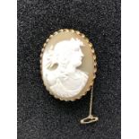 A 9ct gold cameo brooch stamped W. & S.S. 9ct with safety chain.