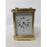 A brass carriage clock inscribed Masons Andover.