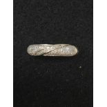 A 9ct gold diamond encrusted band.