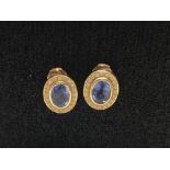 A fine pair of 18ct gold, sapphire and diamond earrings.