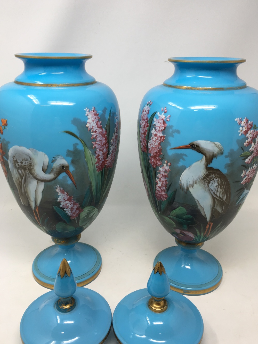 A pair of late 19th Century/early 20th Century painted opaline pedestal lidded vases. - Image 2 of 3