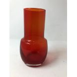 A ruby Riihimaki glass vase.