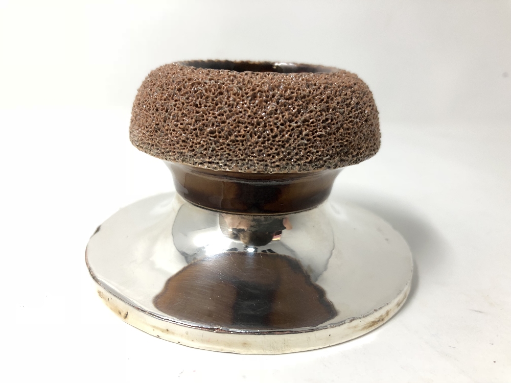 A silver and stoneware pedestal match stick holder.