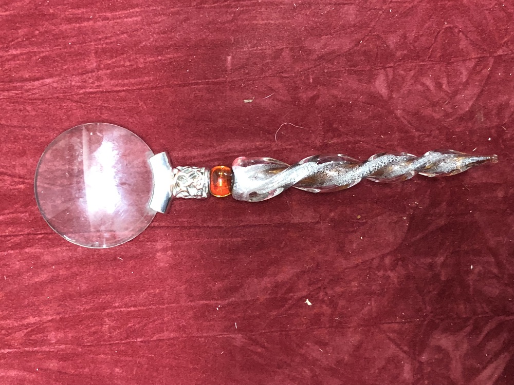 A Murano glass handled magnifying glass with twisted stem.