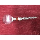 A Murano glass handled magnifying glass with twisted stem.