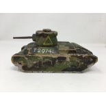 A hand carved wooden (not balsa) and painted model of a WWII Matilda tank.