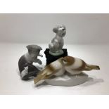 Three ceramic animal figures.