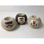 Three stoneware MacIntyre match holders all with coats of arms.
