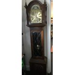 A Contemporary oak longcase clock.