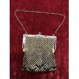 An Art Deco beaded and enamel evening purse.
