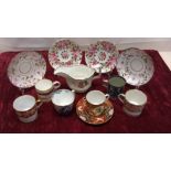 An assortment of 18th Century/19th Century coffee cans and saucers.