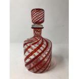 A hand blown Venetian ruby glass decanter and stopper.